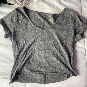 grey cropped shirt